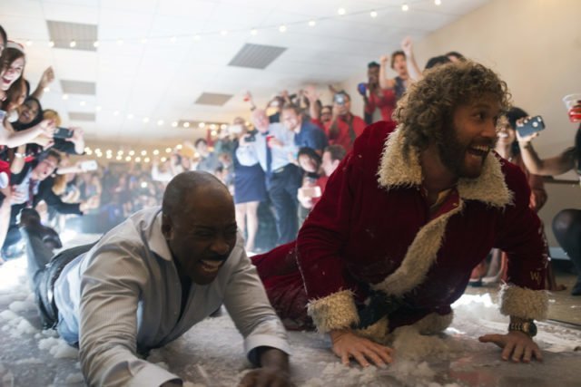 L-R: Courtney B. Vance as Walter, T.J. Miller as Clay Vanstone in OFFICE CHRISTMAS PARTY by Paramount Pictures, DreamWorks Pictures, and Reliance Entertainment